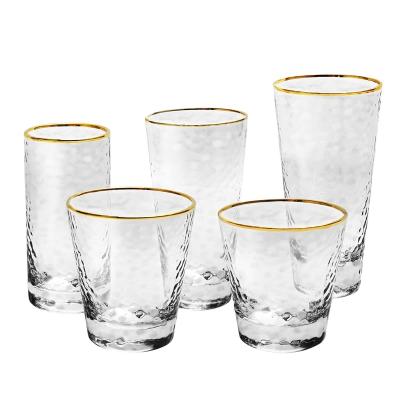 China Custom High Tumbler Coastal Logo Ball Water Glass Cups Gold Rim Hammered Clear for sale