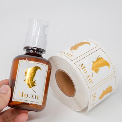 China Waterproof Custom Printing Embossing Clear Gold Foil Perfume Bottle Sticker Label With Logo for sale