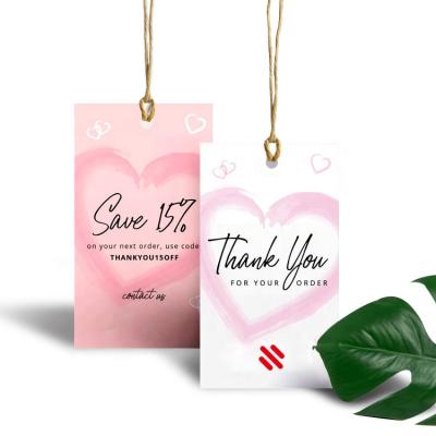 China Viable Customized Luxury Clothes Paper Hang Tags Wholesale Garment Shirt Shoes Bags Dangle Designs Paper Hang Tag for sale