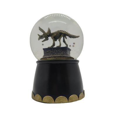 China High Quality Custom Resin Dinosaur Christmas Music Snow Globe From Europe for sale