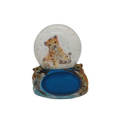 China Europe Logo Cute Tiger Snow Globe Custom Made Santa Custom Music Box Manufacturer for sale