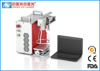 China 7000mm/s Speed Handheld  Laser Marking Machine / Laser Printing Machine for Brass Copper for sale