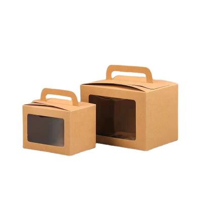 China Handmade Portable Clear PVC Window Kraft Paper Candy Cookie Gift Packaging Box With Handle for sale