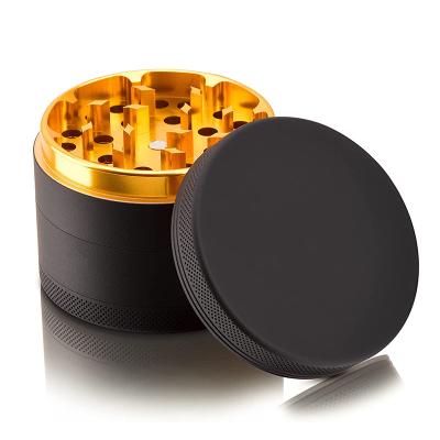 China Custom Logo 63MM Herb Grinder Gold Aluminum Alloy Silicone Coated CNC Sharp Teeth Inside With Magnetic Lid for sale