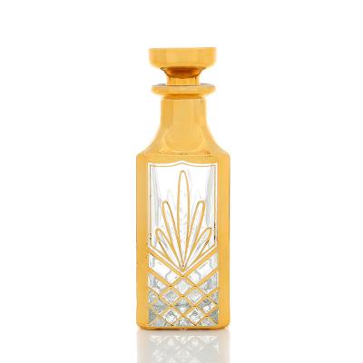 China Personal Care CJ- Square Decorative Luxury Gold Perfume Glass Bottle Decanter 150ML For Arabian Perfume Oud Oil for sale