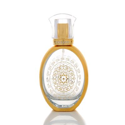 China Personal Care CJ- 50ml Style Arabic Design Sprayer Gold Glass Perfume Bottle for sale