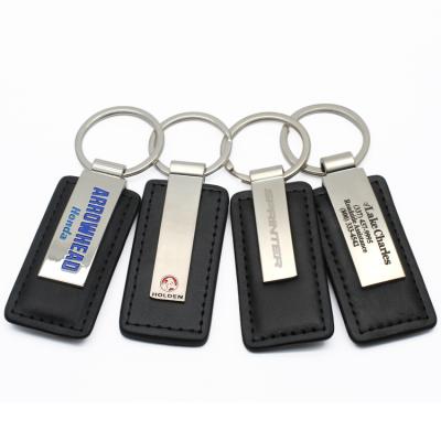 China Promotion Gift Key Chain Factory Wholesale Fashion Men's Metal Leather Key Holder Customize Brands Cars Logo Tag Keychain for sale