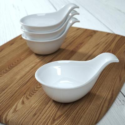 China Japanese Style Sustainable Soy Sauce Dish Unique Shape Ceramic Dish With Handle for sale