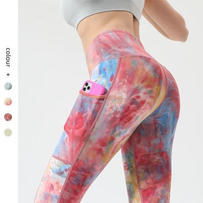 China Breathable Wholesales Stretch Tie Dye Leggings Women's High Waisted Yoga Pants Tummy Control Compression Pantyhose With Pocket for sale