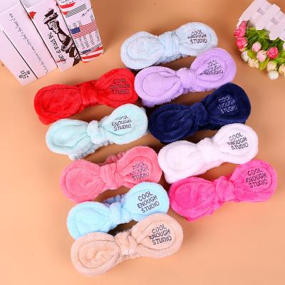 China Wholesale cosmetic headwear factory direct bow fashion letter embroidery flannel headband can be customized for sale