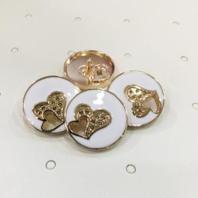 China Sustainable Heart Fashion Hollow Decorated Buttons Double Drip Oil Metal Buttons for sale