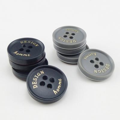 China Resin Viable Wholesale Buttons Factory Black Circular Four - Eye Buttons Clothing Accessories Buttons for sale