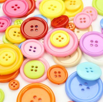 China Durable four-eye color buttons thin edge plastic buttons kids DIY clothing auxiliary for sale