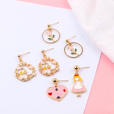 China Fashion Han's Girl's Pink Earrings New Are Cartoon Earrings With Heart Girl's Asymmetrical Flower Earrings for sale