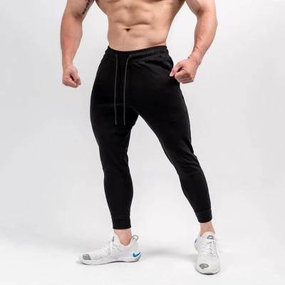 China Breathable Custom Logo Mens Gym Sweat Workout Fitness Pants Mens Sports Joggers With Zipper Pockets for sale