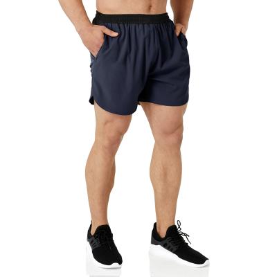 China QUICK DRY Mens Gym Shorts With Pockets Spandex Workout Shorts Sports Mesh Fitness Shorts Two Layers for sale