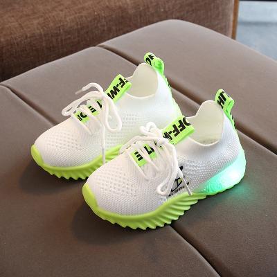 China Non-slip Korean trend of children's colorful luminous LED shoes children's sports shoes high-grade children's shoes round for sale