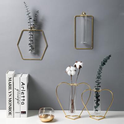 China Home Decors Metal Wall Flower Vase Gold Color Minimalist Hydroponic Glass Vase Wall Mounted Ornaments Vases for sale