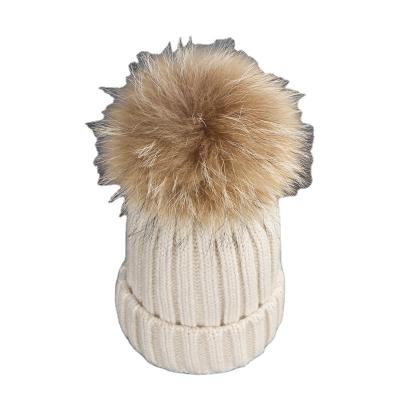 China COMMON 2023 New Winter Solid Knitted Big Wool Ball Wool Hat Women's Thick for sale