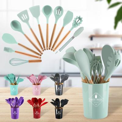 China Viable 12 Pieces In 1 Set Silicone Kitchen Accessories Cooking Tools Kitchen Tableware Cocina Silicone Cookware With Wooden Handles for sale