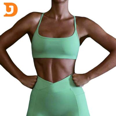 China 2023 New Breathable Bare Slaughtering Upper Cross Back Yoga Women Fitness Gym Clothing Women Sports Wear Strappy Sexy Backless Sports Bra for sale