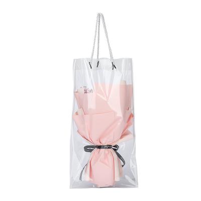 China China Manufacturer Customized Professional Moisture Proof Transparent Plastic Flower Rope Handle Packaging Bags for sale