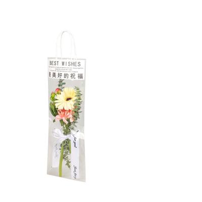 China Safe And Durable Customizable Transparent Moisture Proof Flower Handled Packaging Plastic Bag for sale