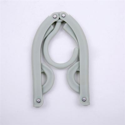 China New Minimalist Hanger Simple Folding Travel Hanger Portable Plastic for sale