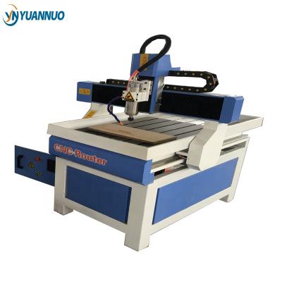 China Chinese cutting YN6090 3d cnc router 600 x 900 with high quality and stability for sale