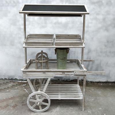 China Sustainable Creative Rural Potted Flower Cart Plants Solid Wood Flower Stand for sale