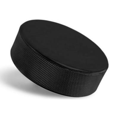 China Smooth Surface And Textured Side Face Shore A Heavy 90 Hardness Cheap Ice Hockey Pucks for sale