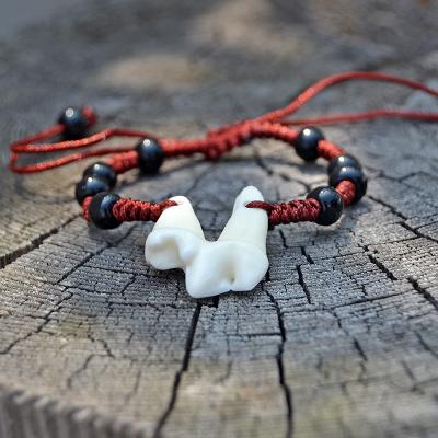 China YS005 Vintage Faux Wolf Tooth Bracelet Men Tibet Amulet Fang Croc Bracelet Handwoven Women United Natural Tooth Bracelets Bone Jewelry for sale