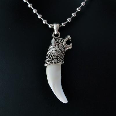 China Vintage Fake Hyena Tooth Necklace Stainless Steel Necklace Tibet Amulet Fang Bone Pendant Silver Wolf Tooth Pendant YX010 for sale