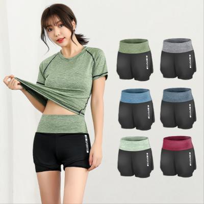 China Simple Outdoor Running Empty Gym Shorts High Waist Breathable Women Exercise Summer Ladies Yoga Pants Quick Dry Shorts for sale