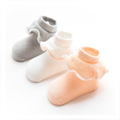 China New Autumn Spring and Ear Edge Baby Socks Kids Cotton Breathable Wooden Socks for sale