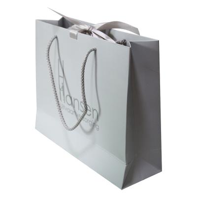 China Recycled Materials Factory Wholesale Kraft Paper Gift Bags Storage Packaging Shopping Bags With Logo for sale