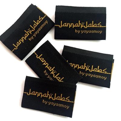 China Sustainable Factory Custom Design Logo End Fold Golden Metallic Yarn Damask Woven Apparel Labels For Garment Apparel for sale