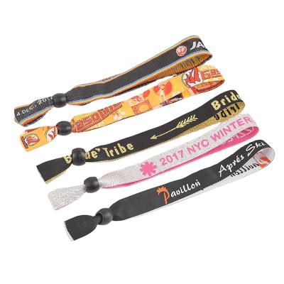 China Fashion Personalized Custom Fabric Wristbands With Logo Jacquard Woven Polyester Fabric Wristbands With Plastic Clip for sale