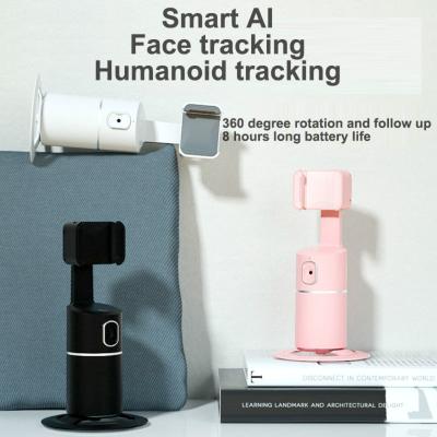 China 2022 New Technology Remote Control Portable Smart Shooting AI Authomatic Face Automatic 360 Rotation Object Tracking Cell Phone Holder for sale