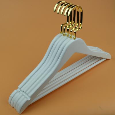 China Factory Sales Delicate Gold White Delicate Hook Wooden Coat Hanger for sale