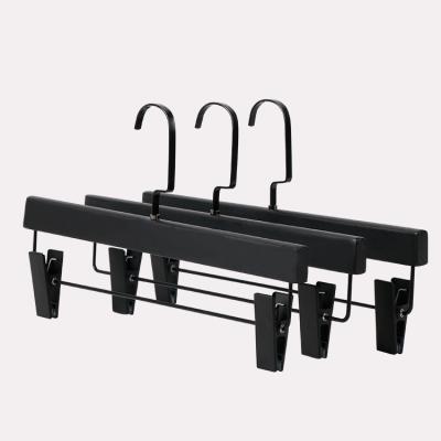 China Hot-stamp Logo Minimalist Logo Pants Hangers Rubber Plastic Pants Hanger With Clips for sale