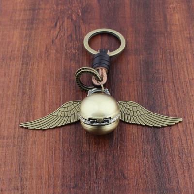 China Classic Angel Wing Keychain Slytherin Hufflepuff Time Turner Watch Quidditch Seeker Key Ring Witchcraft Chain Accessory for sale