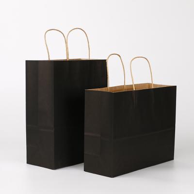 China Custom High Quality Recycled Materials Logo Gold Foil Stamping Matte Black Paper Bag With Ribbon Handle for sale