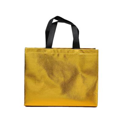 China Custom Logo Tote Bag Film PP Shopping Bag Clothing Storage Golden Non Woven Grocery Bags for sale