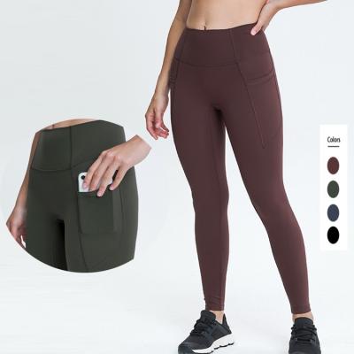 China Breathable High Waist Aligned Side Pockets Seamless Breathable Tight Sports Fitness Yoga Pants Gaiters Women for sale