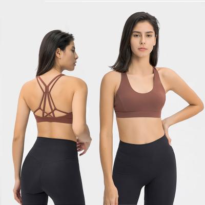 China Padded backless 2021 new stock fashion fitness fashion vest shockproof women breathable gathering colors plus size yoga bra tank tops for sale