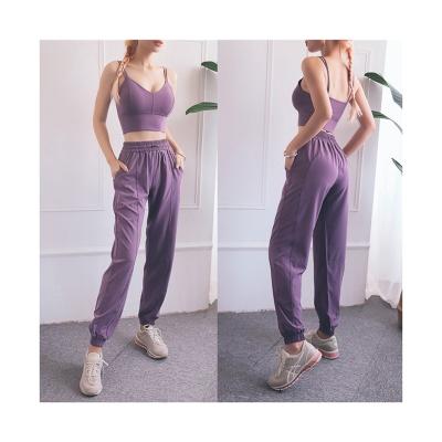 China Four Way Stretch Woman Sports Bra Drawstring Joggers Tracksuits High Waist 2 Pieces Fit Elastic Yoga Set for sale