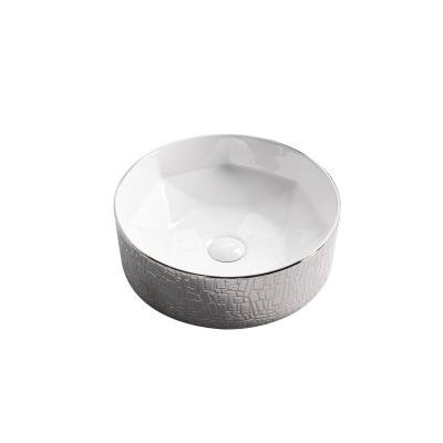 China Modern Fashion Modern Round Shape Silver Plated Over Counter Ceramic Bathroom Sink Hand Wash Basin for sale