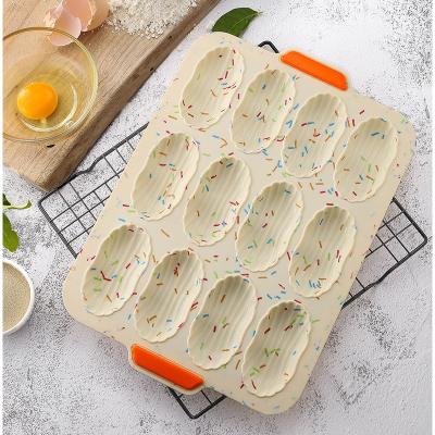 China Disposable Easy To Clean 12 Holes Madeleines Pan Silicone Baking Mold With Handles Nonstick Baking Tray for sale