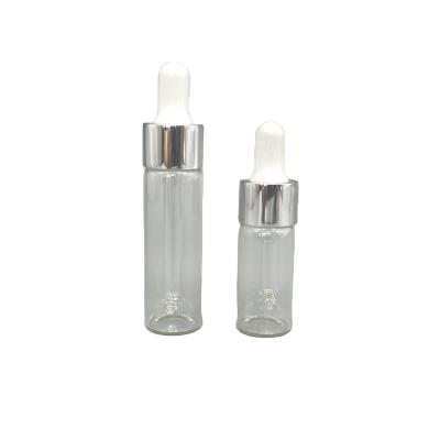 China 10ml 15ml Glass Cosmetic Bottles Straight Shape With Aluminum Oil Dropper for sale